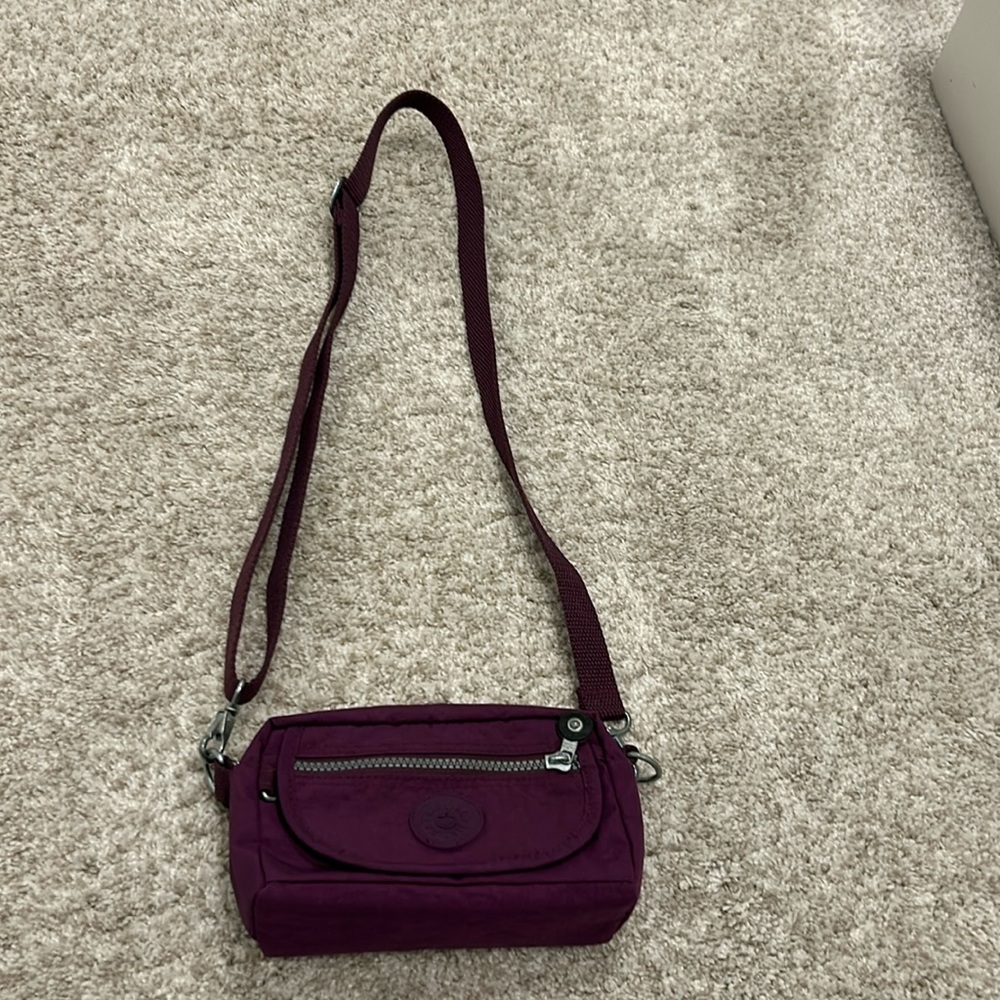 Kipling mini cross body purse. Never used